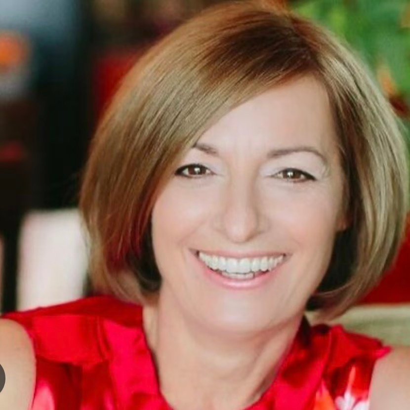 Portrait of Erin Waddell, Facilitator & Coach at Reframe Leadership